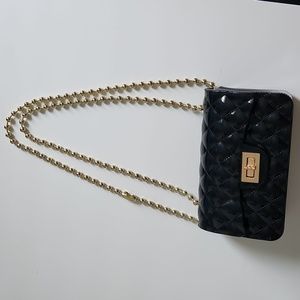 Black crossbody purse withgold chain
